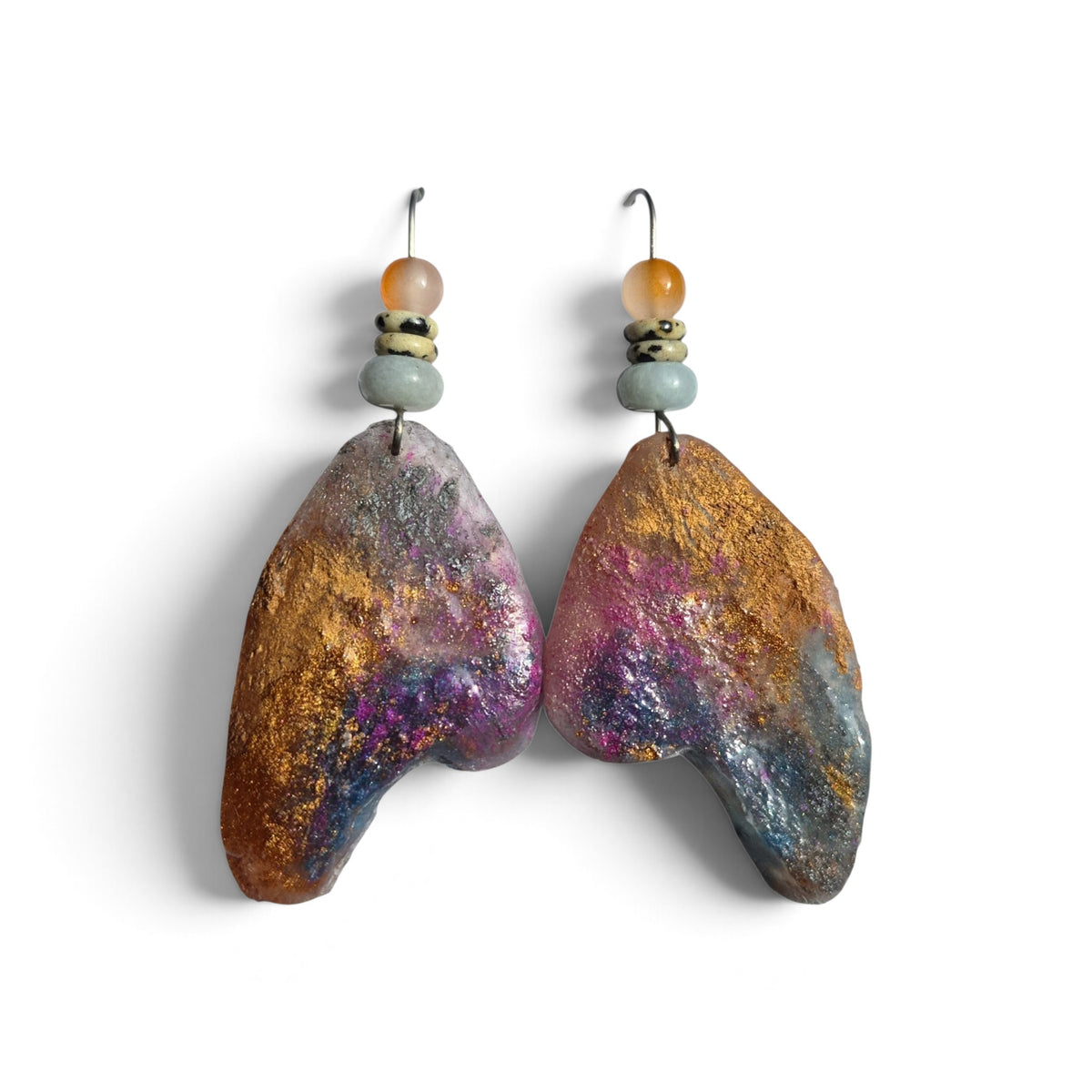 Loergann Studio artisan drop earrings with organic purple, gold, and grey textured pendants and natural bead accents.