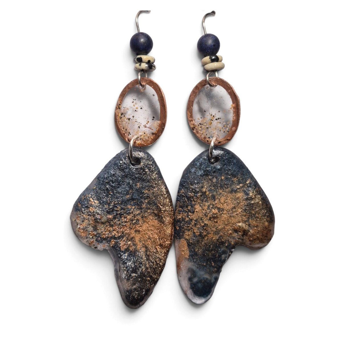 Loergann Studio artisan drop earrings with midnight blue and gold textured resin, copper hoops, and blue bead accents.