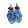 Loergann Studio artisan statement drop earrings with blue textured resin, lapis lazuli, and carnelian beads.