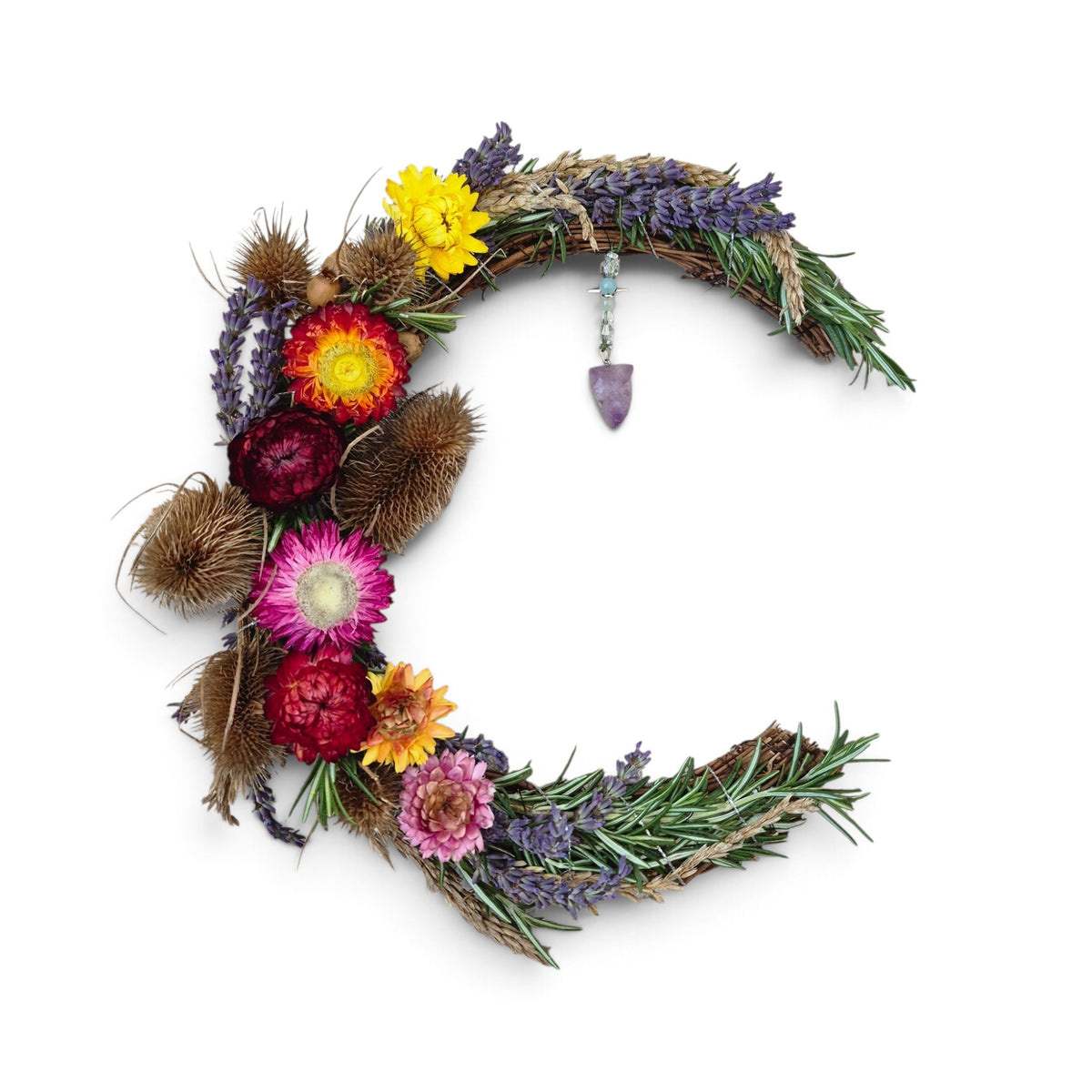 Loergann Studio crescent moon dried flower wreath with lavender, strawflowers, thistles, and a hanging crystal charm.