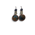 Loergann Studio artisan drop earrings with blue and gold enamel circular pendants and grey navy bead accents