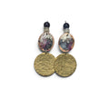 Loergann Studio artisan drop earrings featuring hand-painted celestial discs and hammered brass circles with beads.