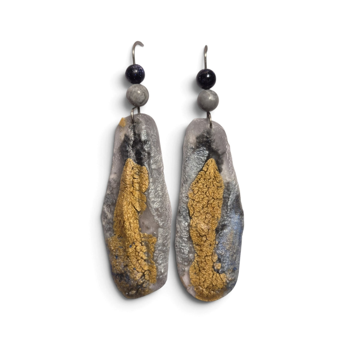 Loergann Studio artisan statement drop earrings with marbled grey, silver, and gold leaf textured pebble silhouettes.
