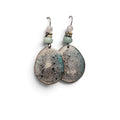 Loergann Studio artisan teardrop earrings featuring speckled slate grey and blue pendants with mint green bead accents.