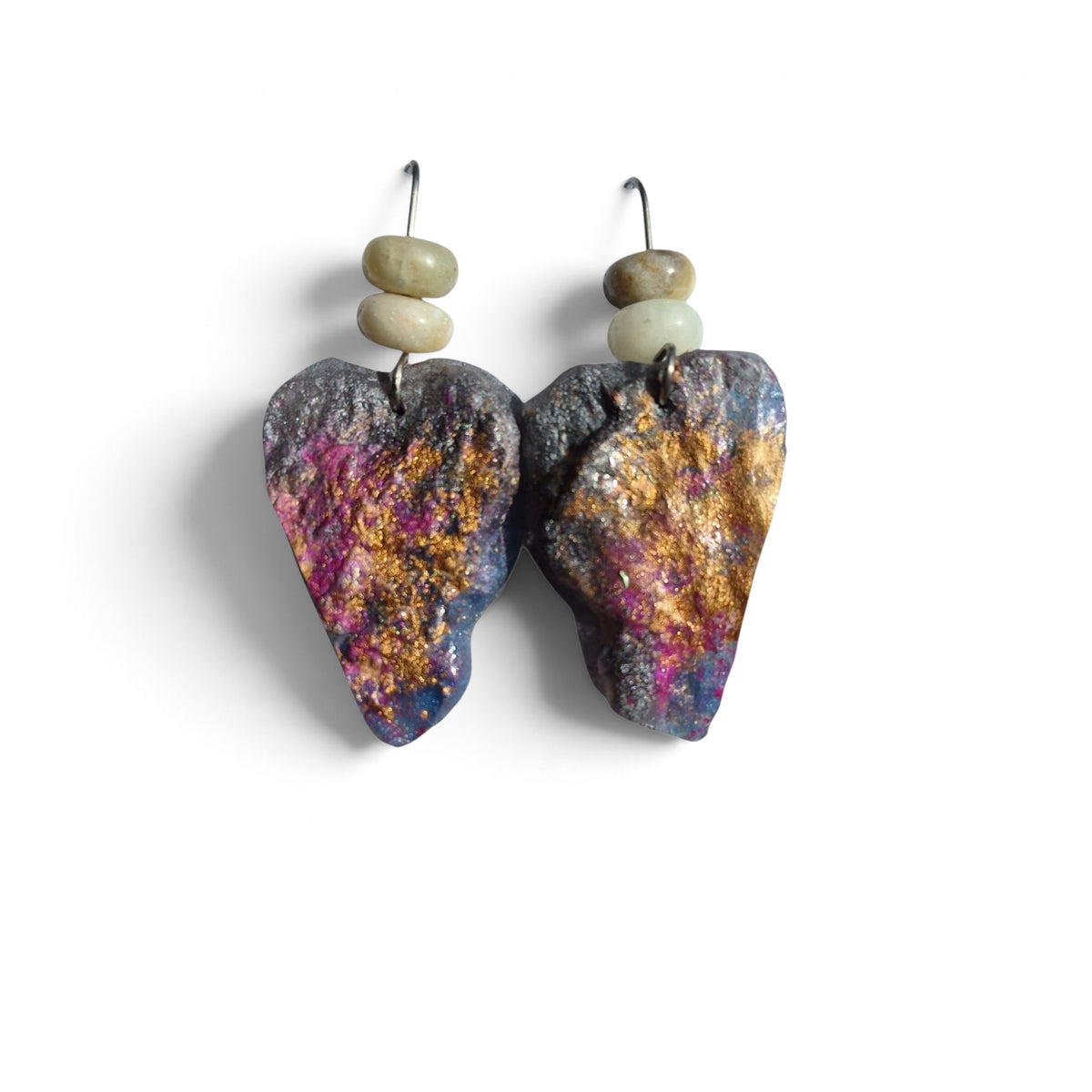 Loergann Studio handcrafted heart-shaped drop earrings with textured magenta, blue, and gold leaf finish and stone beads