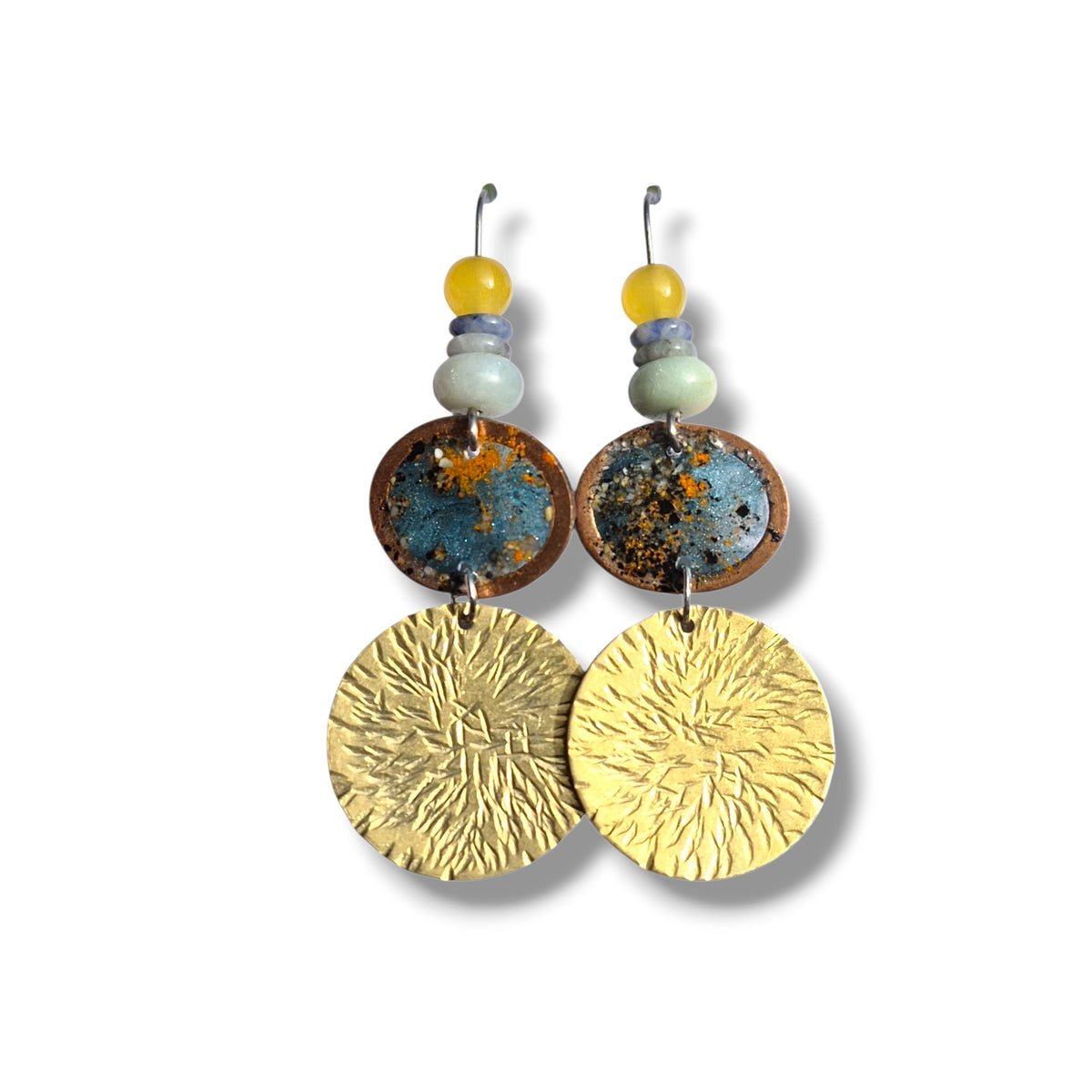 Loergann Studio artisan drop earrings with etched brass discs, blue enamel copper accents, and yellow and grey beads.
